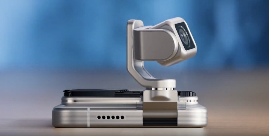 Cмартфон Honor Robot Phone на столе с разложенной камерой