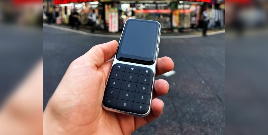 Кнопочный телефон Sidephone