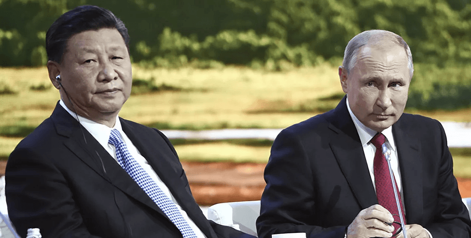 Си Цзиньпин слева) и Владимир Путин (справа)