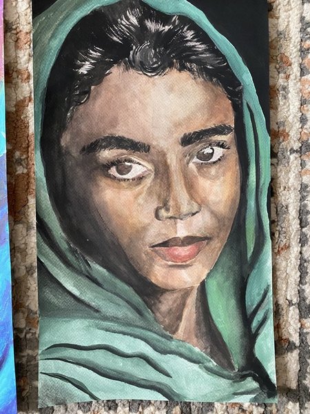 Невідома у хустці