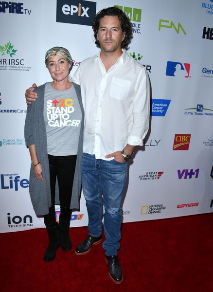 Шеннен Доэрти, Курт Исвариенко