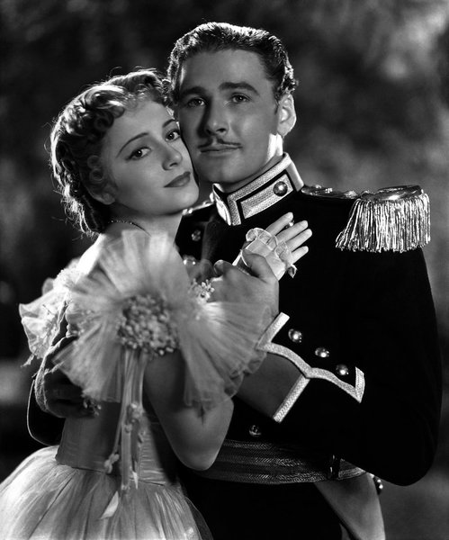 Оливия де Хэвилленд и Эррол Флинн фото