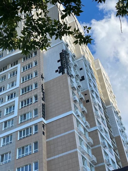 Поврежденный фасад дома в Белгороде