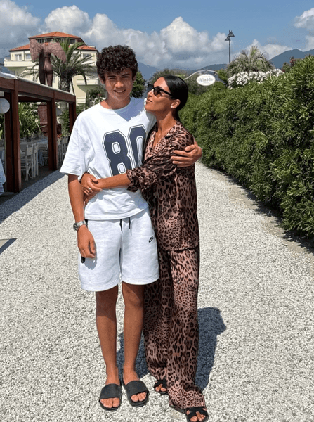 Санта Дімопулос із сином